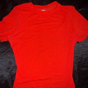 SKIMS red short sleeve shirt